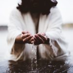 Biblical scene – of Jesus Christ drinking water with his hands