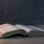 Bible on wooden background