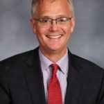 District President, Allan R. Buss